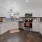 spacious kitchen with ample lighting throughout